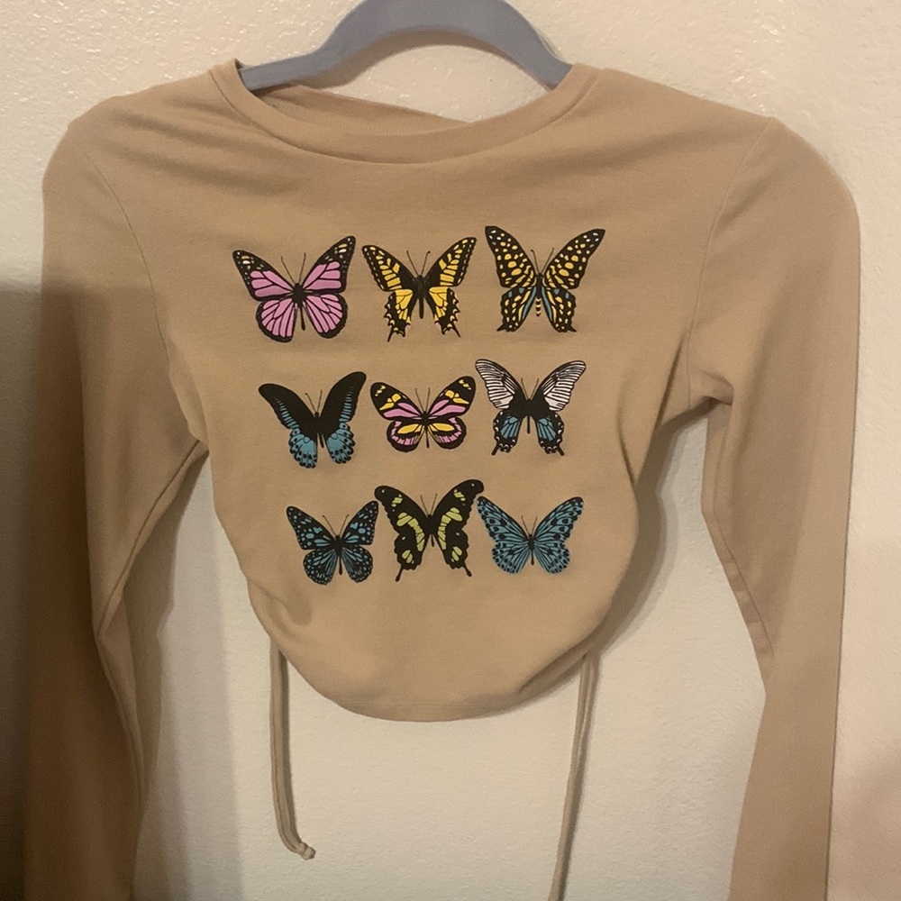 Urban Nation size M butterfly top